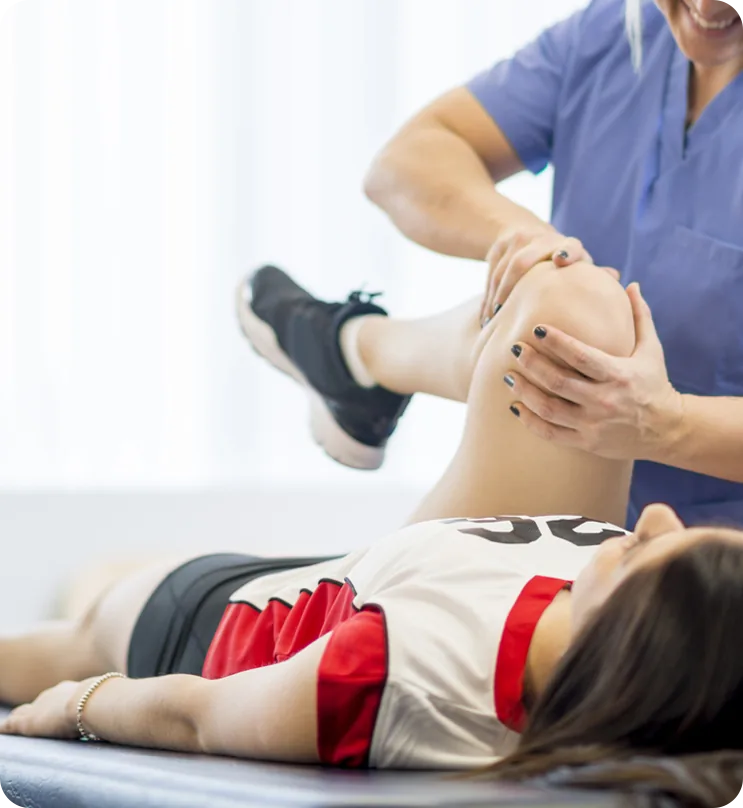 Physical therapist treating a patient at Total Rehab Solutions